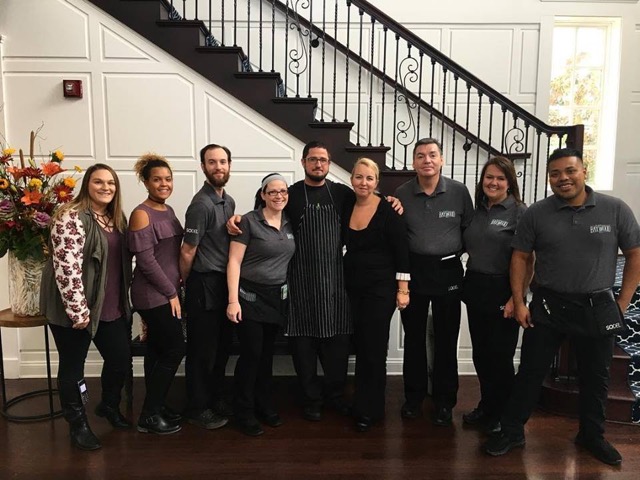The staff at The Clubhouse at Baywood takes a brief moment to celebrate the sold-out Thanksgiving buffet dinner. Shown are (l-r) Marissa Lombardi, Mercedes Dukes, Matthew Herbert, Jaime Gillespie, Chef Tom Deptula, General Manager Lisa Chambers, Eduardo Requena, Stephanie Beach and Zimri Gomez. SUBMITTED PHOTO
